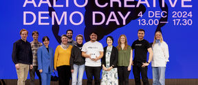 A group photo of pre-incubator teams on Marsio Stage at the Aalto Creative Demo Day event.